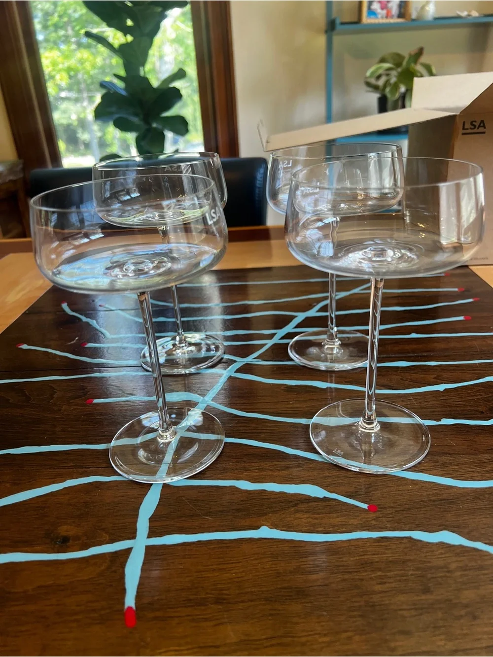 LSA Metropolitan Champagne and cocktail glasses